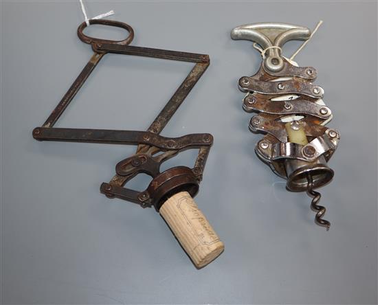 Two 19th/20th century concertina corkscrews, one stamped Armstrong patent